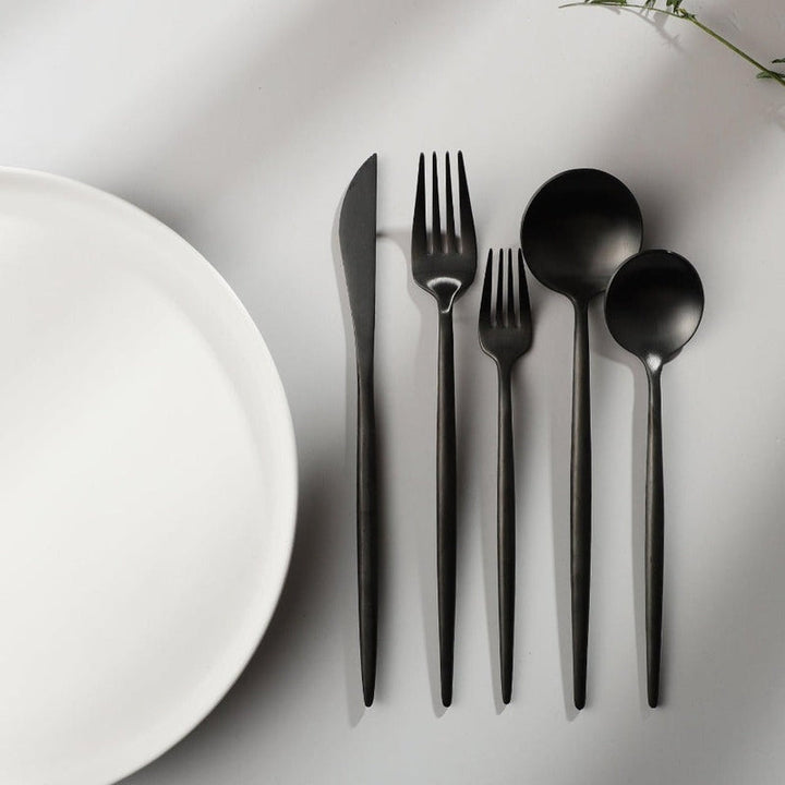 Elegant dinnerware set, modern cutlery for a timeless table design.