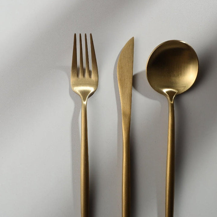 Black modern flatware set, minimalistic design for sophisticated home dining.