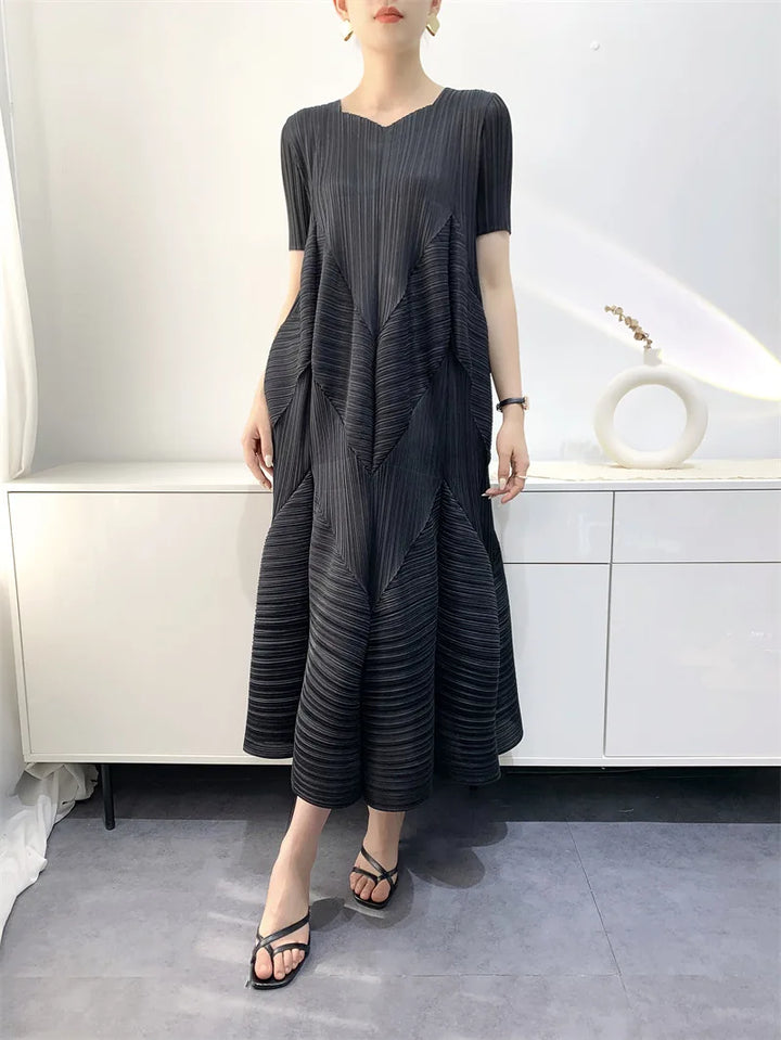 Black sleeveless bubble dress for women, a comfortable and fashionable long summer staple.