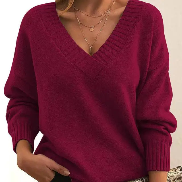 Elegant women's round neck knit sweater. Soft long-sleeve pullover, a cozy top for winter & everyday comfort.