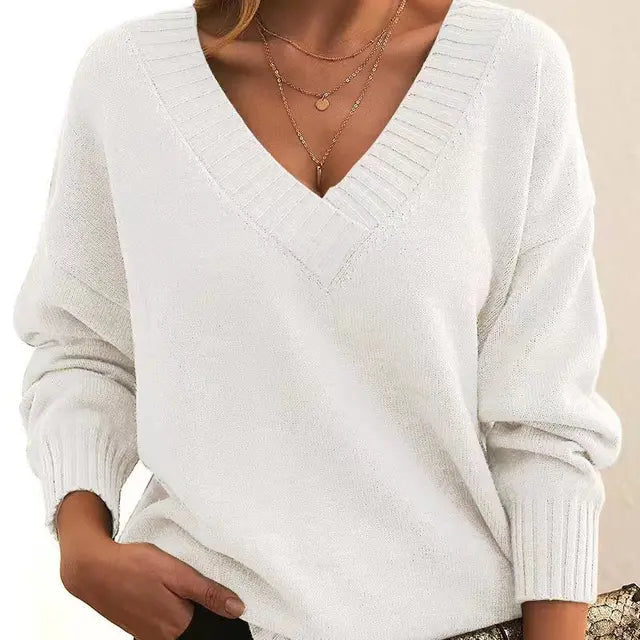 Stylish women's soft knit pullover. Warm long-sleeve sweater, perfect for elegant winter fashion & coziness.