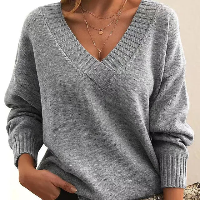 Soft & warm women's knit sweater. Elegant long-sleeve pullover for cozy winter fashion & stylish daily wear.