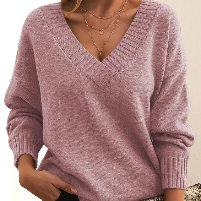 Women's classic soft knit sweater. Cozy long-sleeve pullover for everyday comfort & elegant winter apparel.