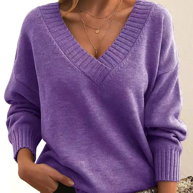 Ladies' soft knit round neck sweater. Elegant long-sleeve pullover for warm winter fashion & daily wear.