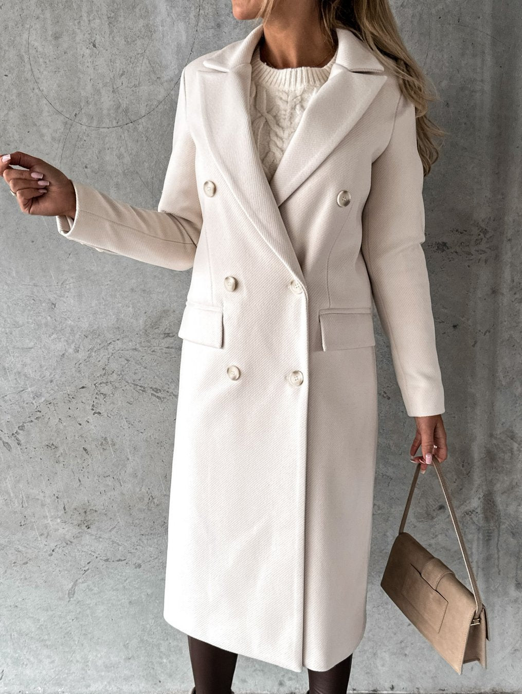 Chic women's elegant winter coat. Warm and fashionable outerwear designed for style in cold weather.