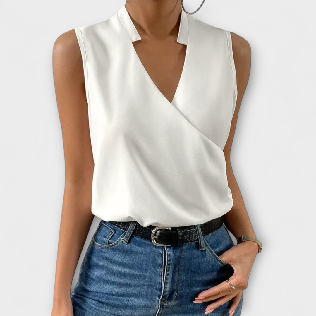 Elegant women's V-neck top for sophisticated summer style and comfortable casual wear.