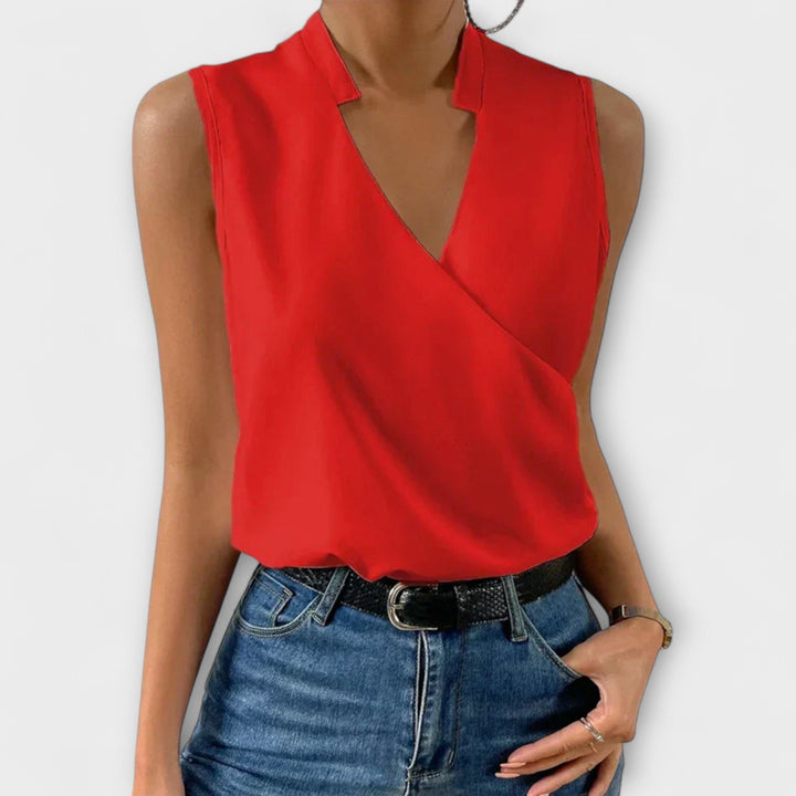Sophisticated V-neck women's top, great for a stylish summer look and versatile day wear.