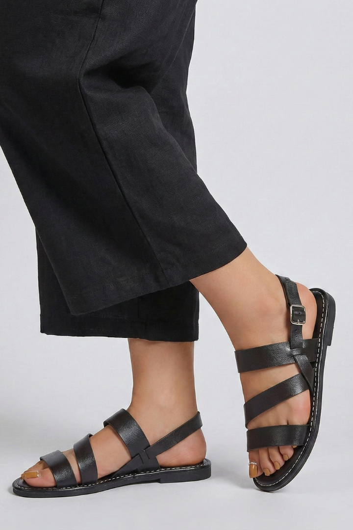 Comfortable modern flat sandals for women, featuring a chic design & supportive back strap.