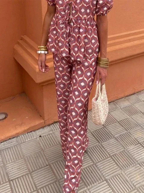 Stylish women's matching outfit with a vibrant pattern, ideal for summer fashion.