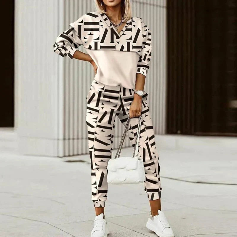 Chic women's casual tracksuit with a fashionable zipper top. Ideal modern loungewear & activewear set.