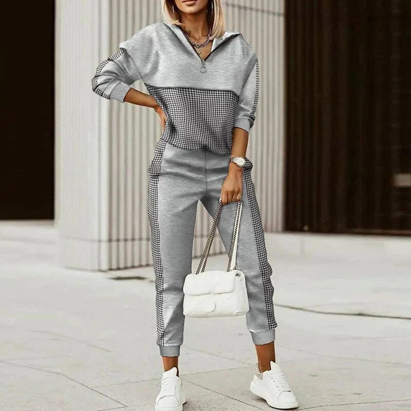 Comfortable women's modern casual tracksuit with a stylish zipper top, great for daily wear & leisure.