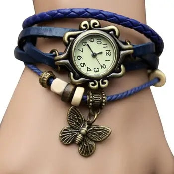 Women's fashion watch with a unique floral patterned dial and matching vintage bracelet design.