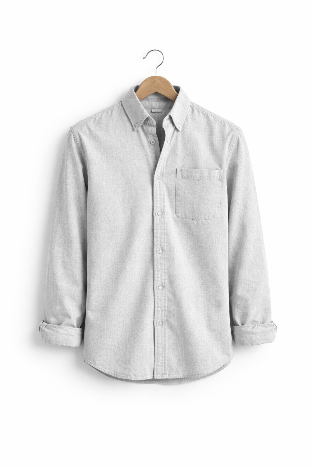 Effortless style: men's relaxed fit chambray shirt. Comfortable long sleeve button-up for daily wear.