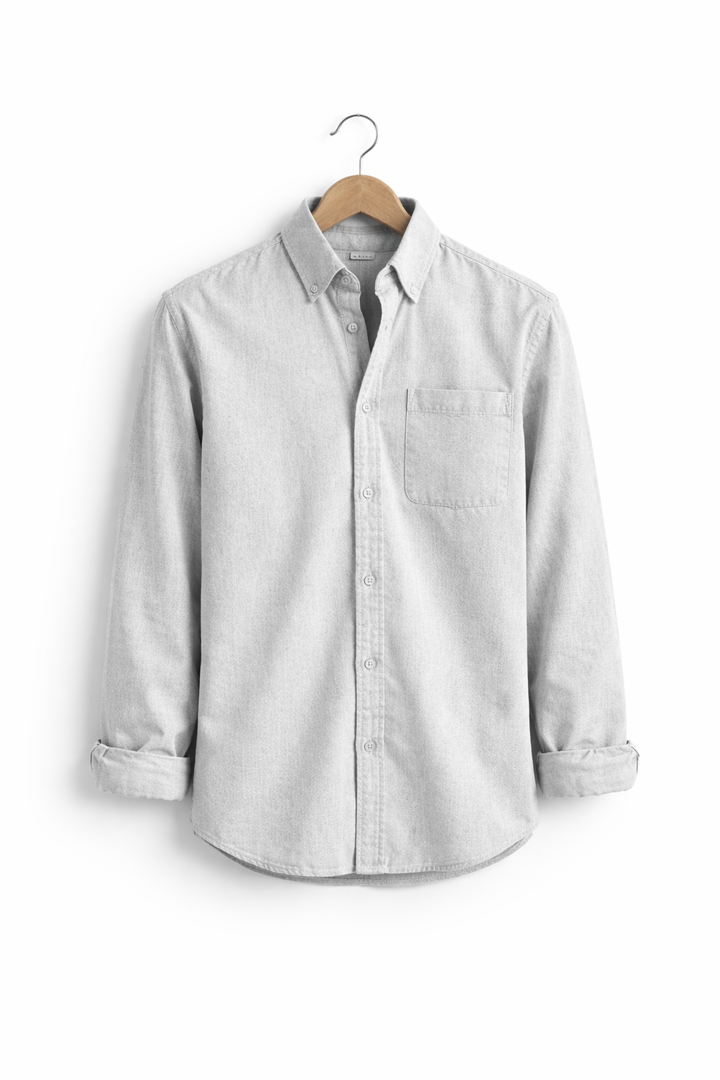 Effortless style: men's relaxed fit chambray shirt. Comfortable long sleeve button-up for daily wear.