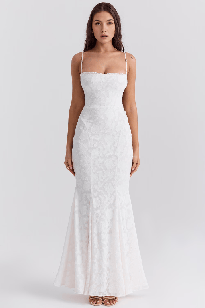 Elegant summer silhouette women's flowing maxi dress, versatile for casual or evening wear. Comfortable fashion choice.