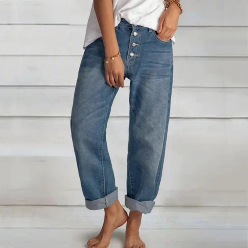 Comfortable women's loose-fit high-waist blue denim jeans, perfect for a chic everyday look.