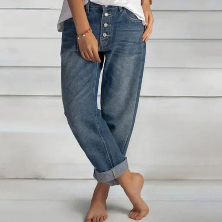 Stylish women's high-waist loose-fit blue jeans, comfortable and versatile for everyday casual fashion.