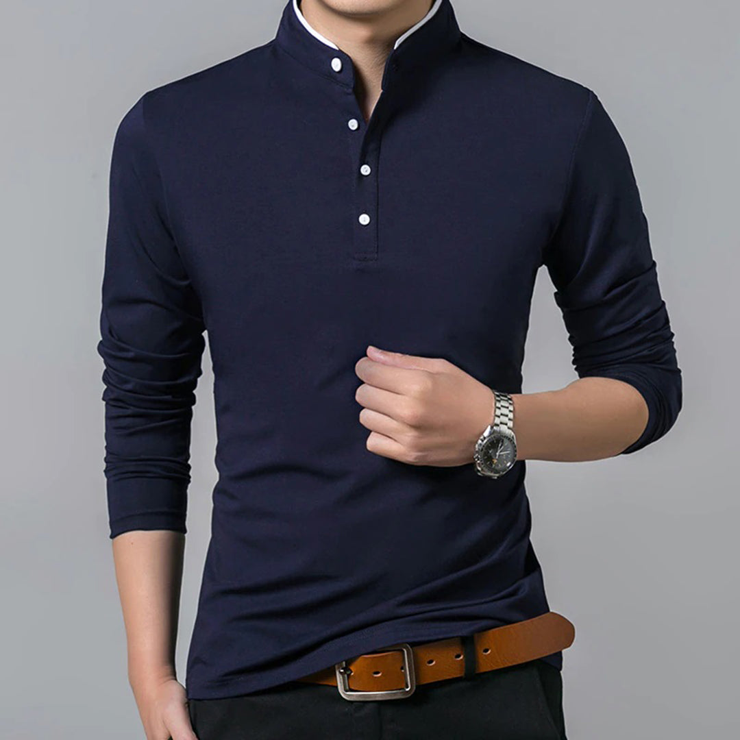 Full shot of a man wearing a sleek, slim-fit long sleeve polo shirt with a modern mandarin collar, ideal for men's fashion.