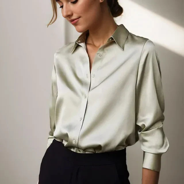 Women's modern button-down shirt with long sleeves, perfect for chic office wear or smart casual everyday elegance.