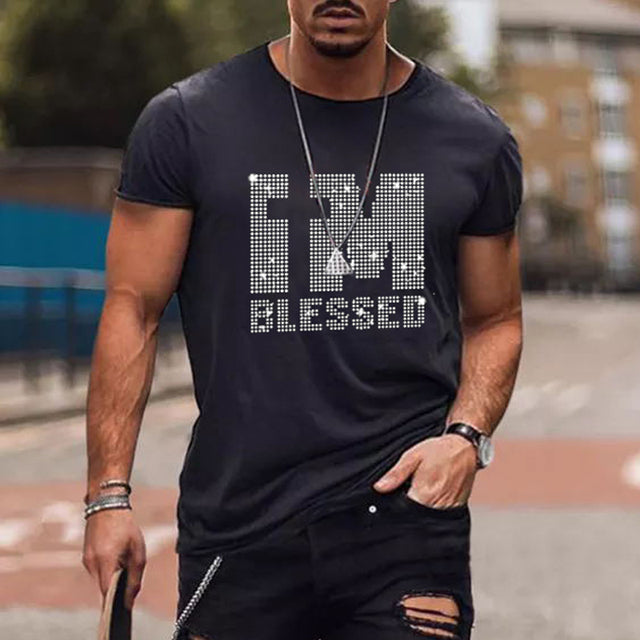 Premium men's black graphic t-shirt, slim fit, showcasing a glittery rhinestone crown. Men's fashion.