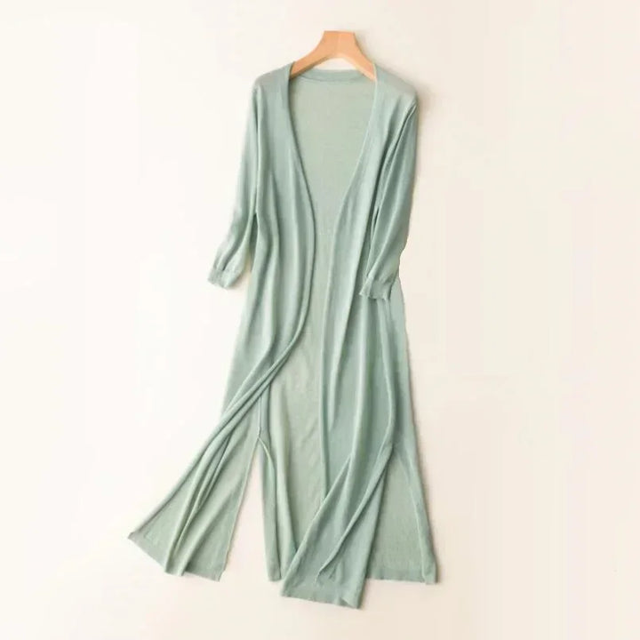 Cozy women's long open front cardigan, perfect layering piece for relaxed spring & fall outfits.