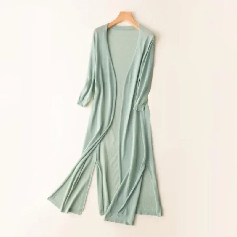 Stylish black long open front cardigan for women, a versatile layering piece for casual elegance.