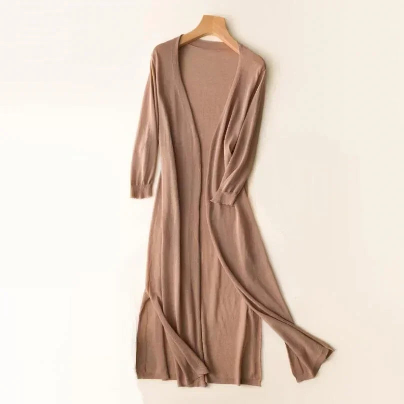 Women's comfortable long open front cardigan, perfect for spring layering or elegant fall outerwear.