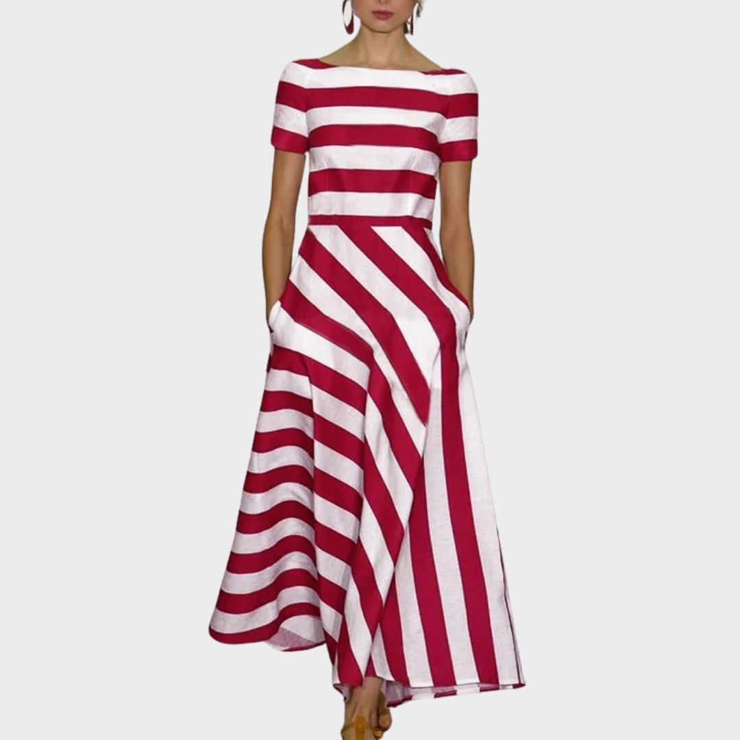 Light & flowy women's A-line dress with stripes, boat neckline, and short sleeves. Perfect casual summer wear.