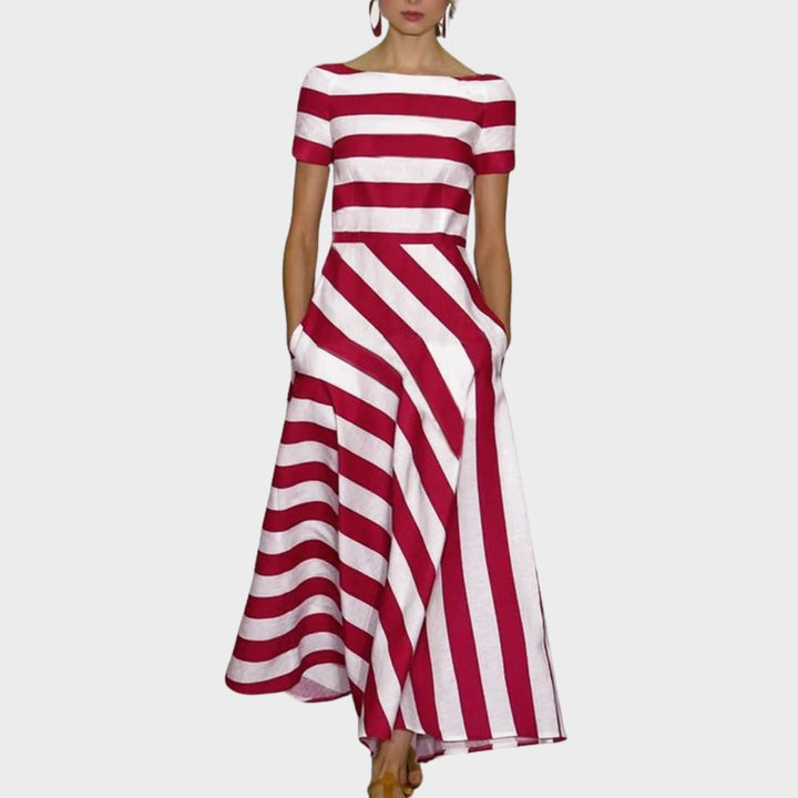 Light & flowy women's A-line dress with stripes, boat neckline, and short sleeves. Perfect casual summer wear.