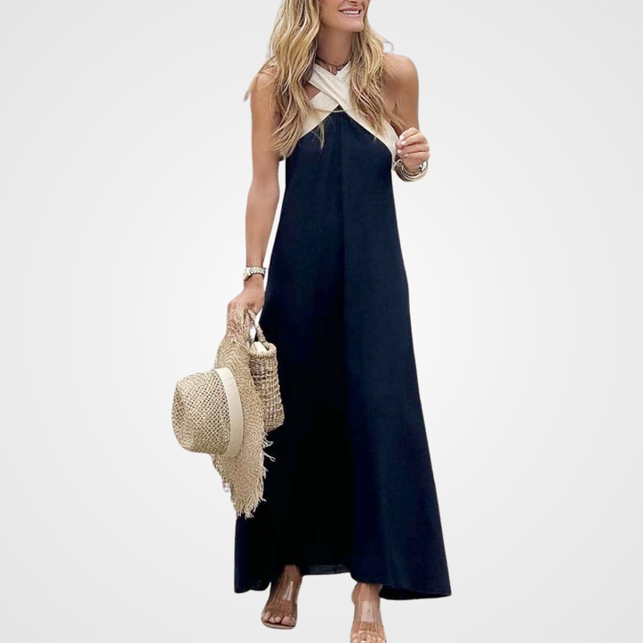 Elegant white halter cross-neck summer dress for women, perfect for vacations & beachwear.