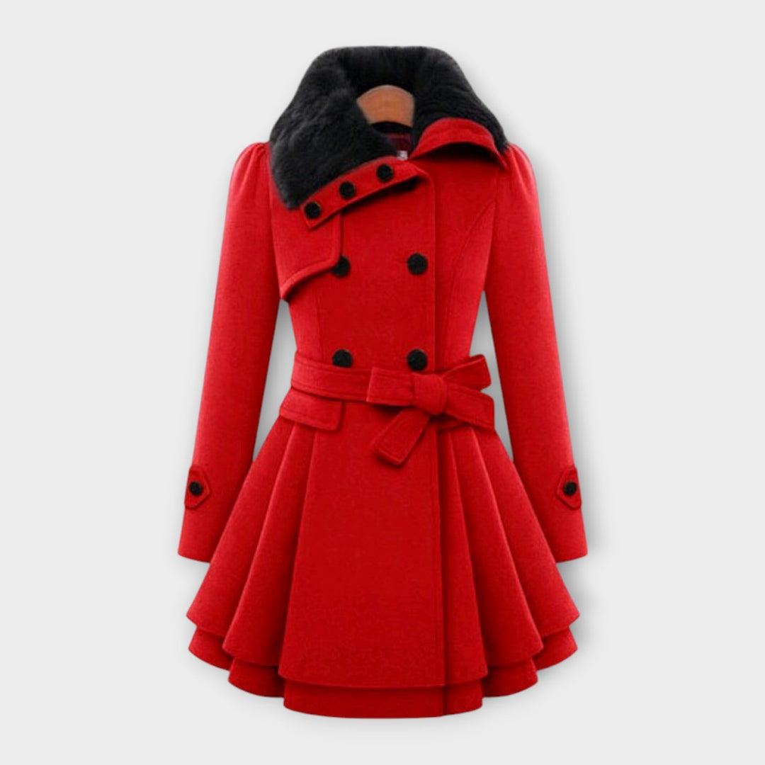 Tailored women's long winter coat featuring a luxurious faux fur collar. Elegant double-breasted design, perfect outerwear.