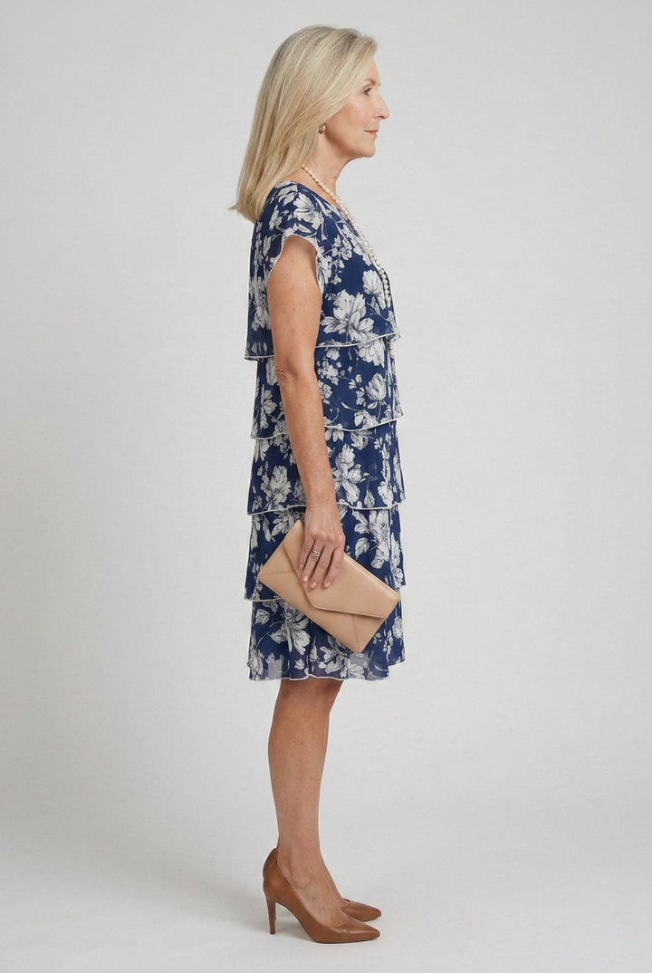 Elegant women's short sleeve, round neck tiered dress in a dusty color, ideal for casual summer outfits.