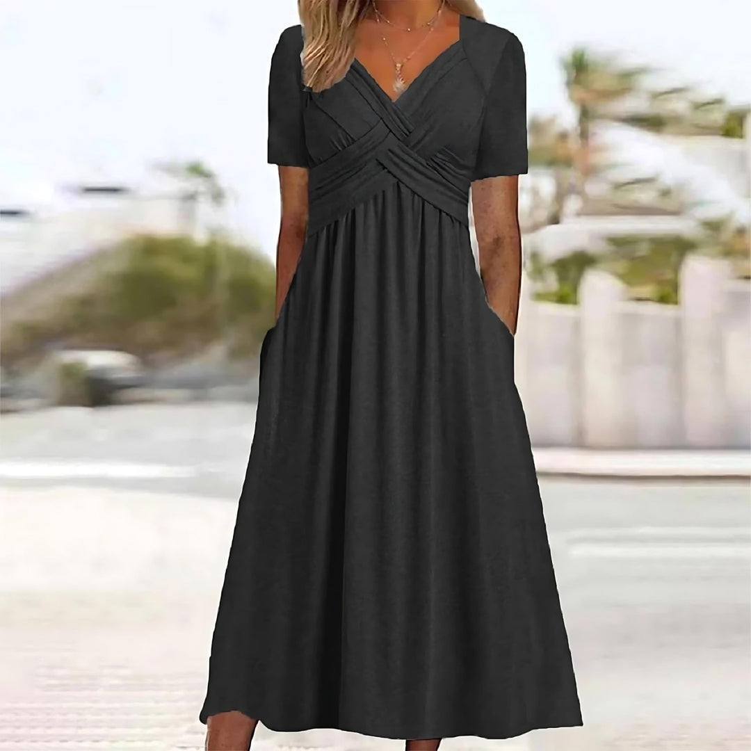 Versatile women's midi dress, comfortable for everyday or special occasions, offers flattering belly coverage.