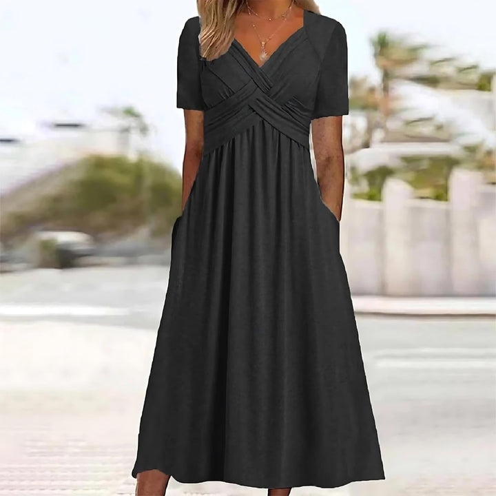 Versatile women's midi dress, comfortable for everyday or special occasions, offers flattering belly coverage.