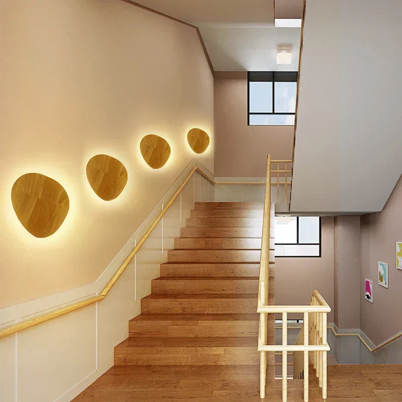 Minimalist Scandinavian wooden wall lamp with warm LED light, perfect for modern Nordic home decor.