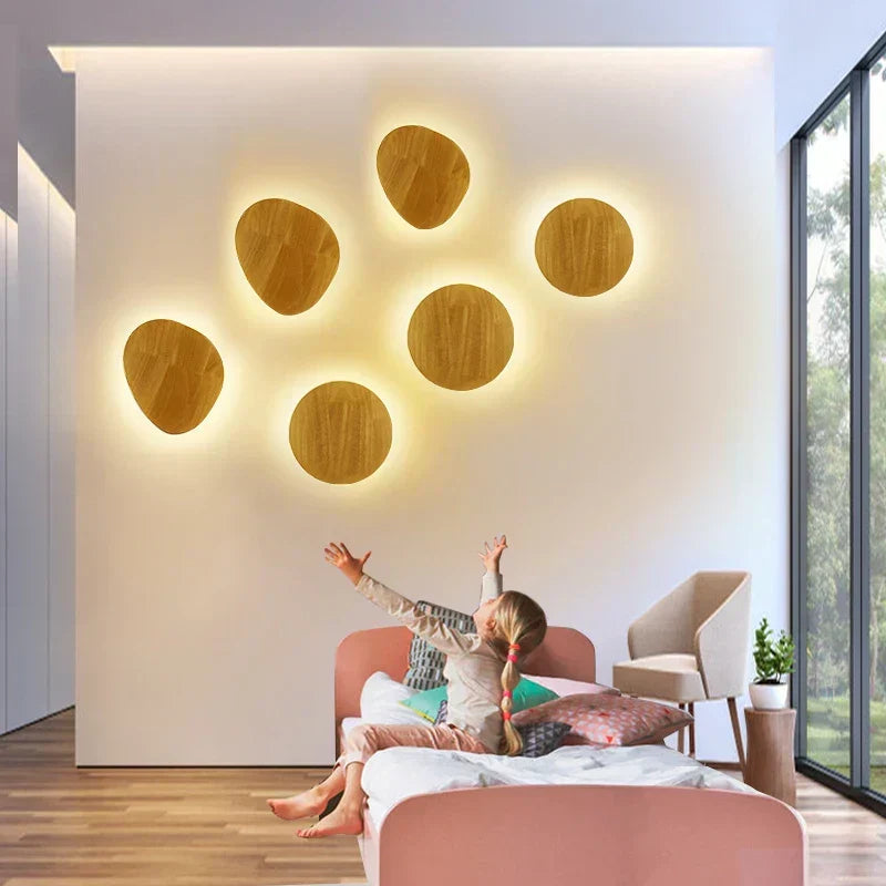 Chic Scandinavian wooden wall lamp; minimalist design and warm light create a cozy home accent.