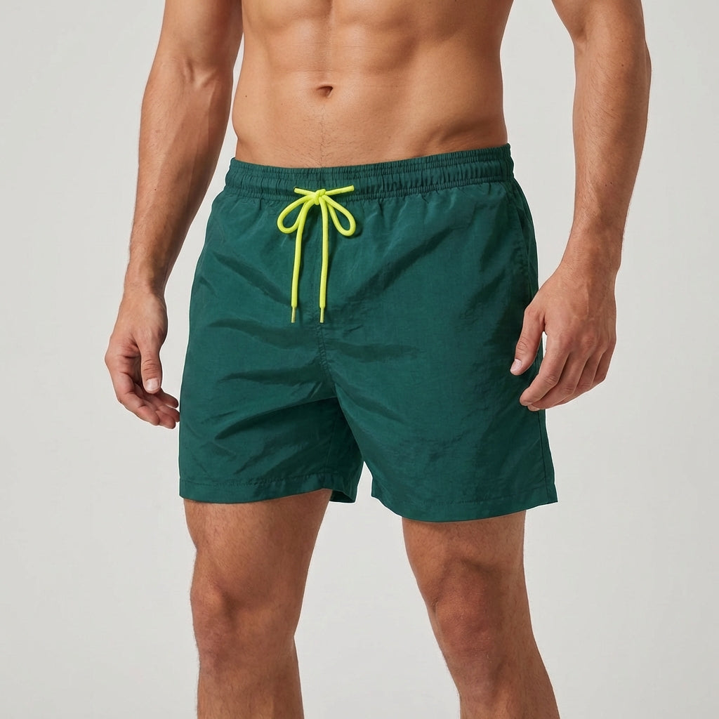 Men's athletic quick-dry board shorts, elastic waist for comfort, perfect for swimming & beach activities.