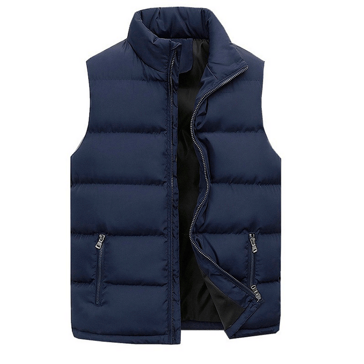 Stylish men's puffer vest, quilted design for warmth, features practical zip pockets for winter layering.