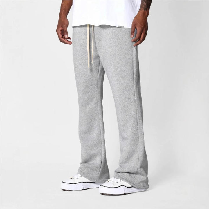 Men's flared sweatpants in a relaxed fit, perfect for ultimate comfort and modern casual style.