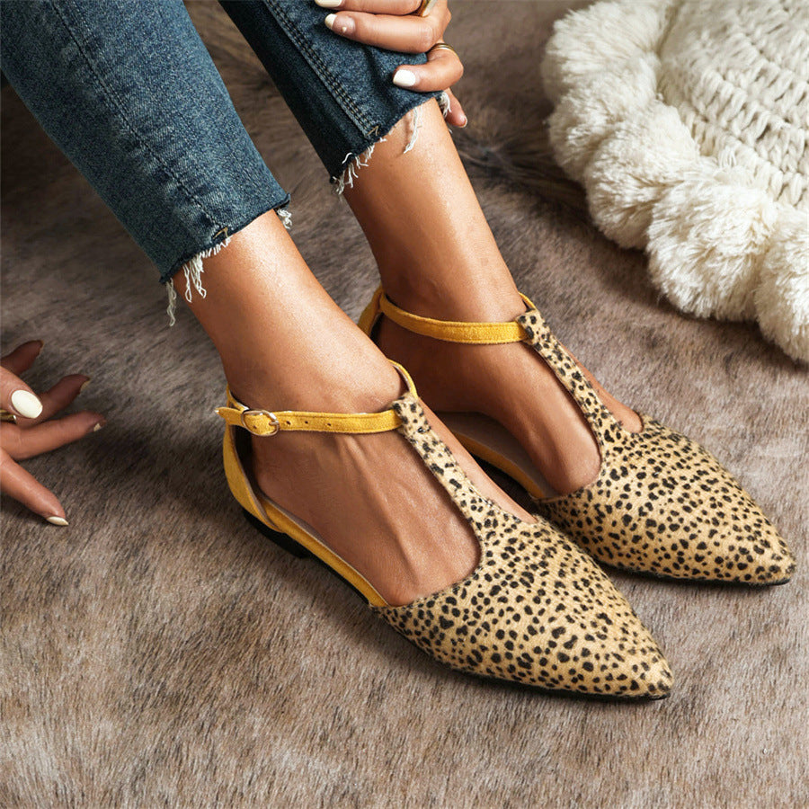 Comfortable Women's T-Strap Ballet Flats, ideal for everyday wear or dressy occasions. Elegant pointed toe design.