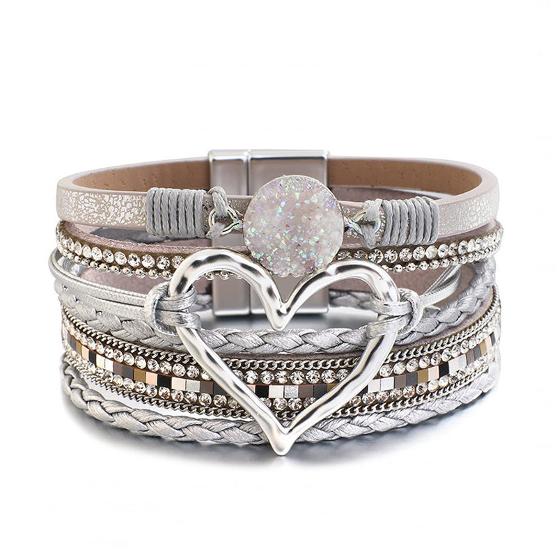 Natural stone bohemian bracelet for women, featuring a prominent rhinestone heart charm. Boho accessory.