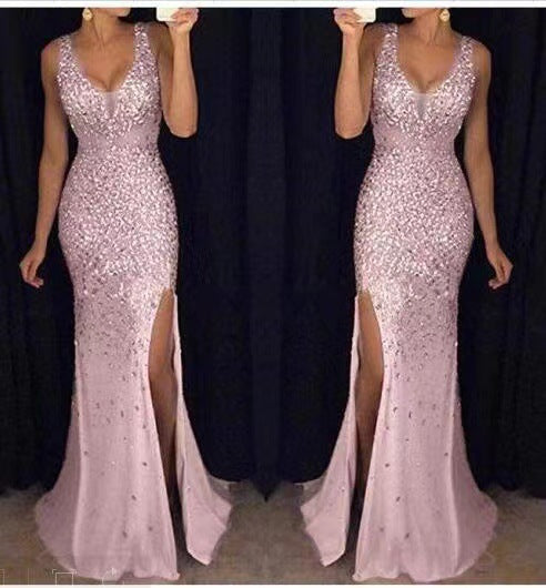 Stunning women's sleeveless V-neck ball gown, shimmering with sparkle & featuring an elegant high thigh slit.