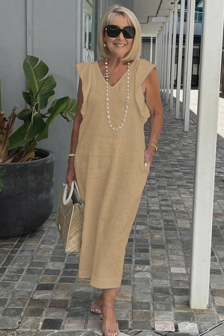 Women's elegant sleeveless maxi dress in flowy fabric, a chic V-neck summer style offering ultimate comfort.
