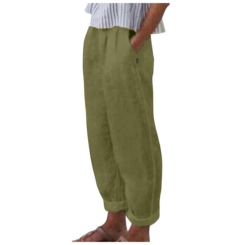 Women's relaxed fit trousers, offering a comfortable & stylish silhouette with practical pockets for casual everyday wear.