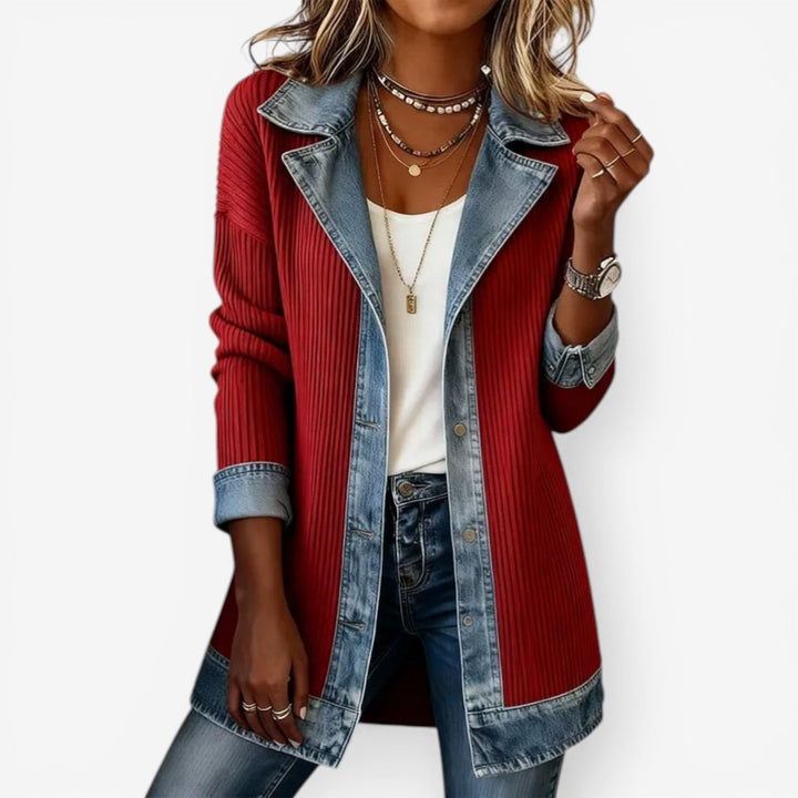 Women's elegant jacket showcasing a layered collar and classic buttons. Modern, chic, and versatile fashion.