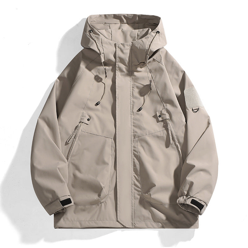 Essential women's adventure gear: a waterproof outdoor jacket with an adjustable hood for diverse weather.