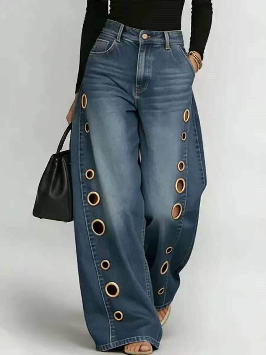 Denim wide-leg jeans for women, high-waisted and trendy with distinctive decorative eyelets.
