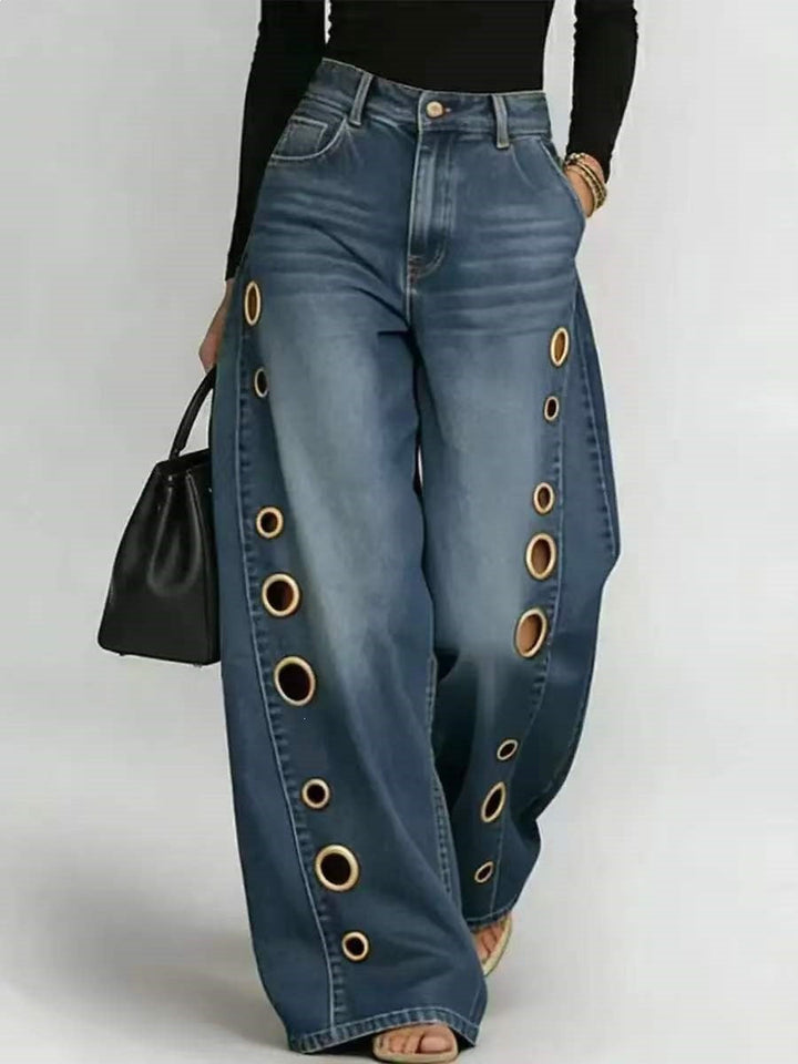 Denim wide-leg jeans for women, high-waisted and trendy with distinctive decorative eyelets.