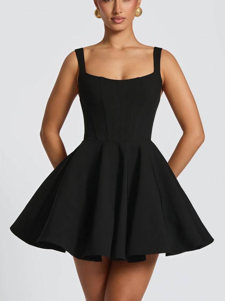 Gorgeous women's cocktail dress, ideal for formal wear, showcasing a large bow & elegant flowing skirt.
