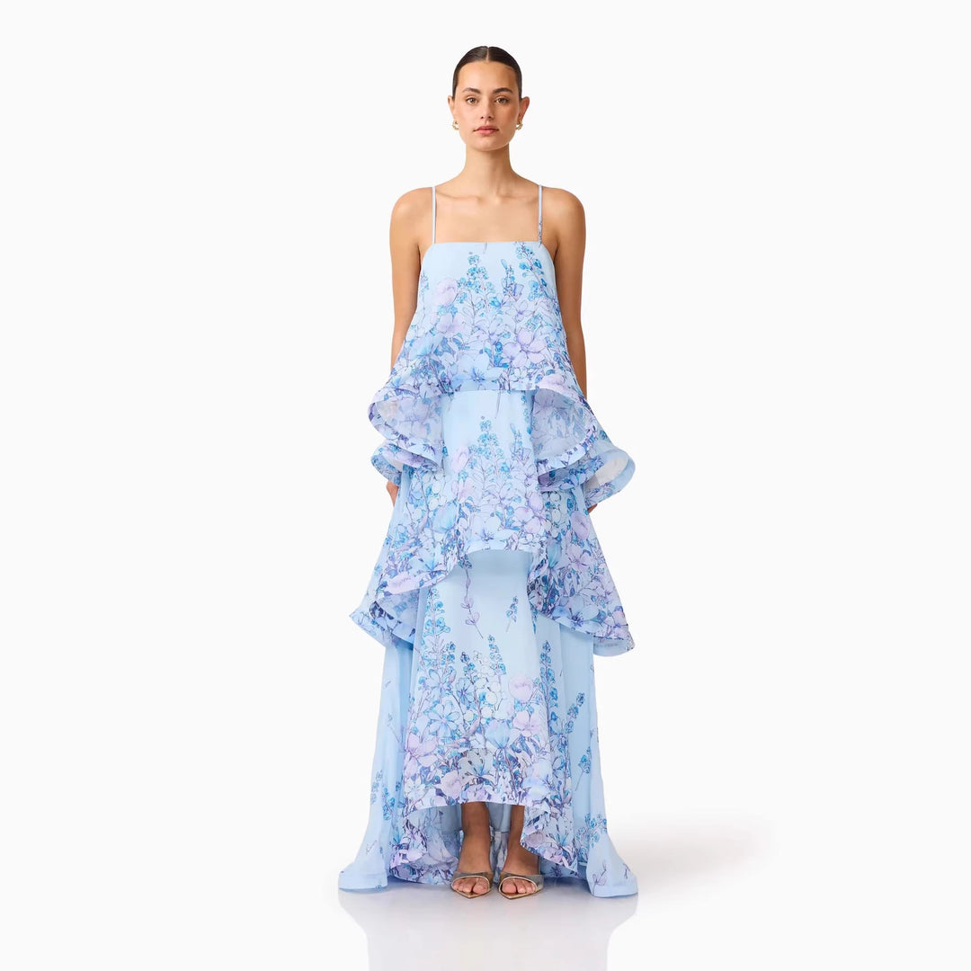 Stylish women's long party dress featuring delicate ruffle details and a flattering silhouette.